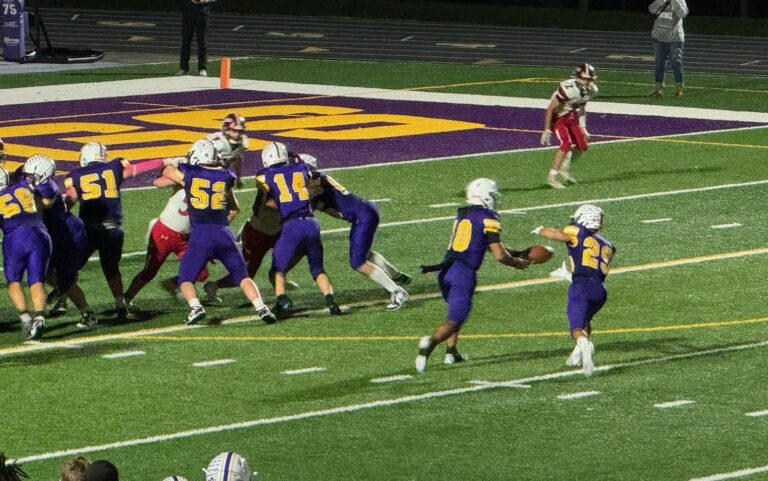 Bloom Carroll's Beau Sherman runs at Logan Elm defense- Litter Media/Dan Ramey