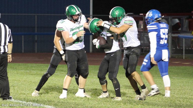 Huntington's Dalton Nichols is showered by his teammates after scoring a touchdown in a Huntsmen 43-6 win at Southeastern
