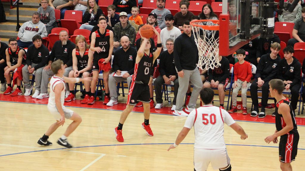 RCCA's Nathaniel Clevenger aims from beyond the arc against Piketon