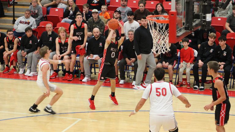 RCCA's Nathaniel Clevenger aims from beyond the arc against Piketon