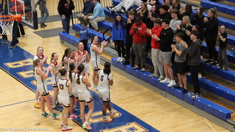 The Lady Tigers celebrate a Sweet 16 win with their Circleville classmates.
