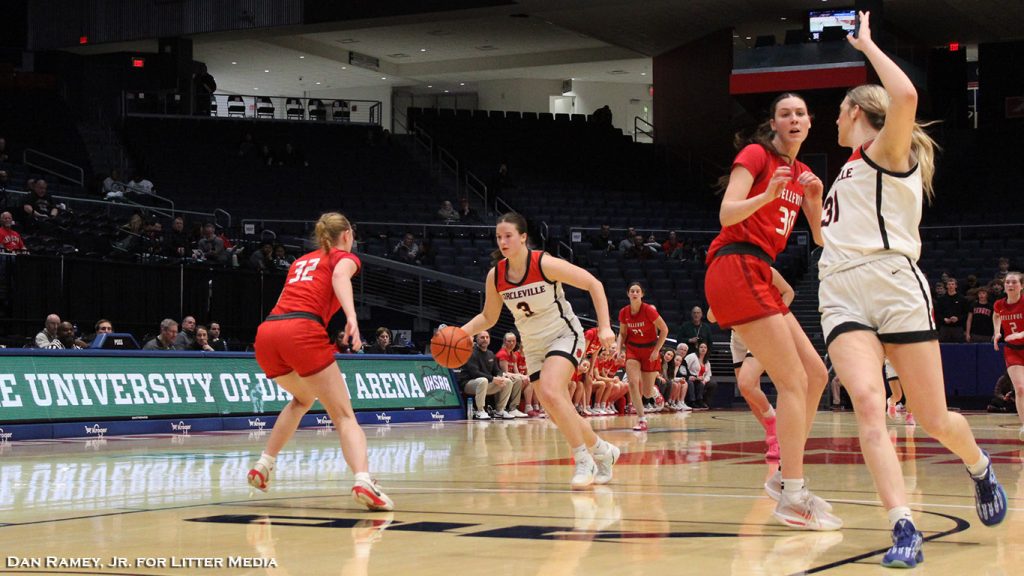 Circleville's Maddie Blakeman drives against Mazie Gracemyer in the second half of the Tigers' State Semifinal with Bellevue.