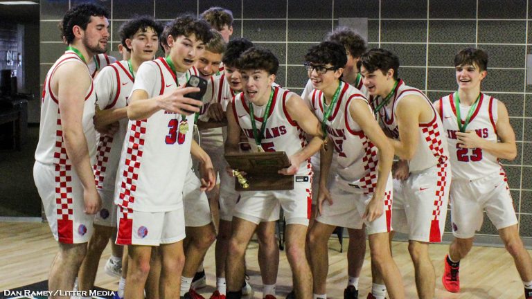 Paxton Ryan becomes the camera man for a postgame selfie.