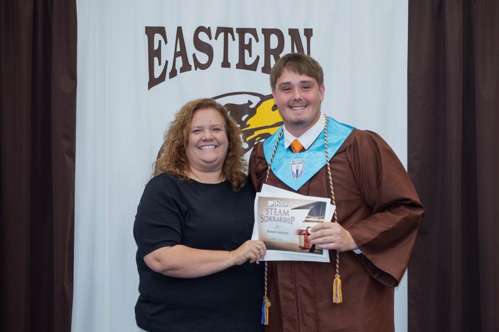 SOCCo’s Senior Communications Specialist Cindi Remy presents Brewer Tomlison with the Southern Ohio Cleanup Company STEAM scholarship during Eastern High School’s Senior Awards Day.