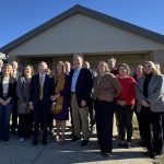 Local and state dignitaries pose in front of the new Piketon School-Based Health Clinic on the campus of Piketon Jr/Sr High.