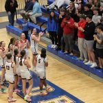 The Lady Tigers celebrate a Sweet 16 win with their Circleville classmates.