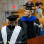 Dr. Michael Koop receives his outstanding faculty achievement award.