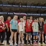 Bainbridge's Ainsley Weaver (middle) poses with the 2026 Elks Hoop Shoot 10-11 year-old top three finishers and representatives from the National Elks Hoop Shoot Tournament. Courtesy Elks Hoop Shoot YouTube Channel