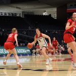 Circleville's Maddie Blakeman drives against Mazie Gracemyer in the second half of the Tigers' State Semifinal with Bellevue.