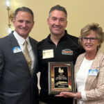2025 RCCVB Grand Pineapple Recipient, Jeremiah Johnson with Curt McAllister and Melody Young. Courtesy Gene Betts/RCCVB