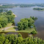 Aerial view of Lake Loramie State Park. Air temperatures are rising but water temperatures remain dangerously cold. Wear a life jacket every time you are on our near the water. 