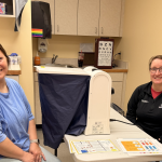 Fayette County Public Health Director of Nursing Ashley Roberts (left) received a Dermascan screening performed by OSU Fayette County Extension Educator Sarah Sowell at a recent clinic.